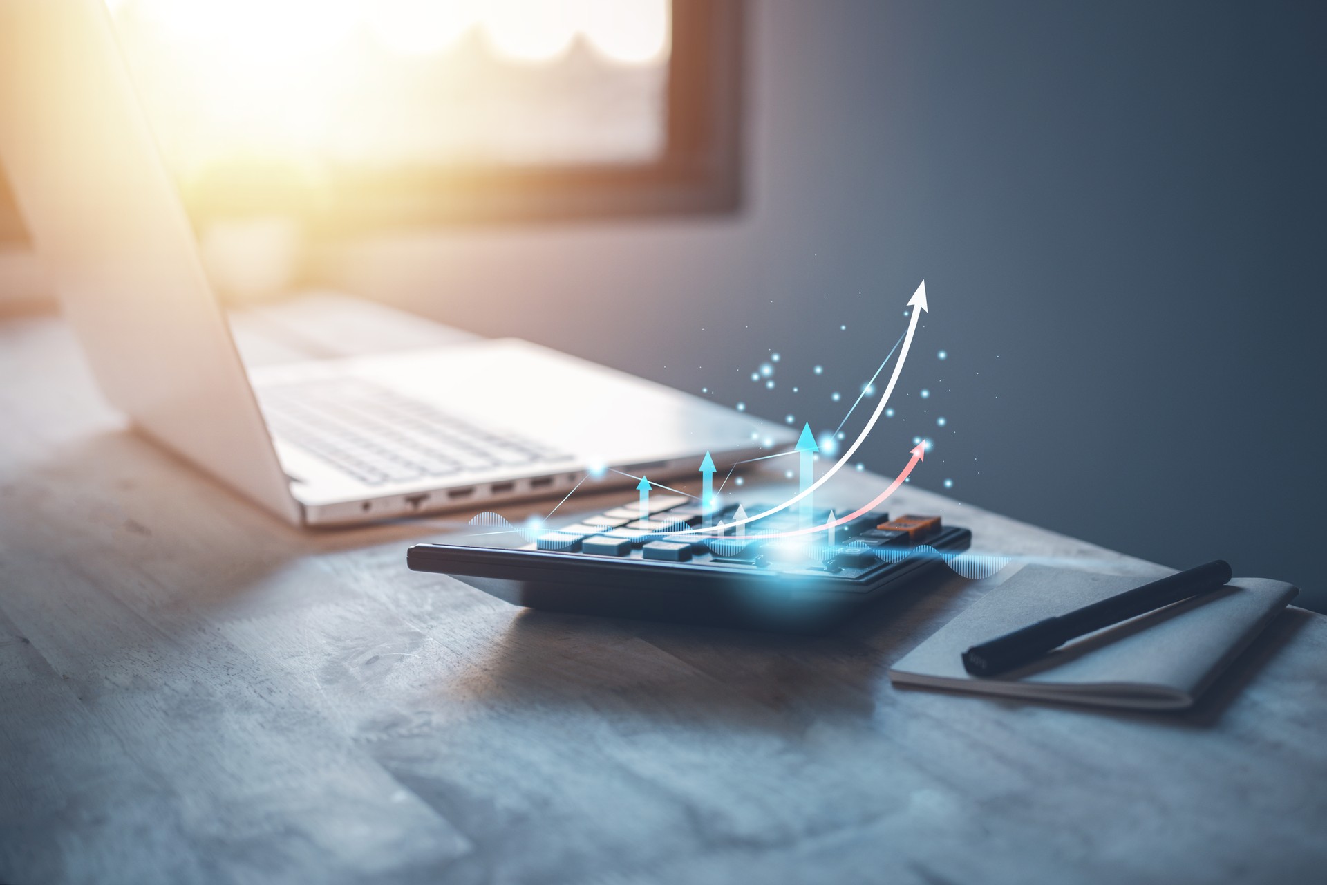 Individual income tax paid and corporations concept with calculator and laptop (notebook) of Data analysis, Paperwork, financial research, and report.